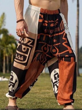 graphic pants are from the brand Manfinity and feature an ankle-tied bottom